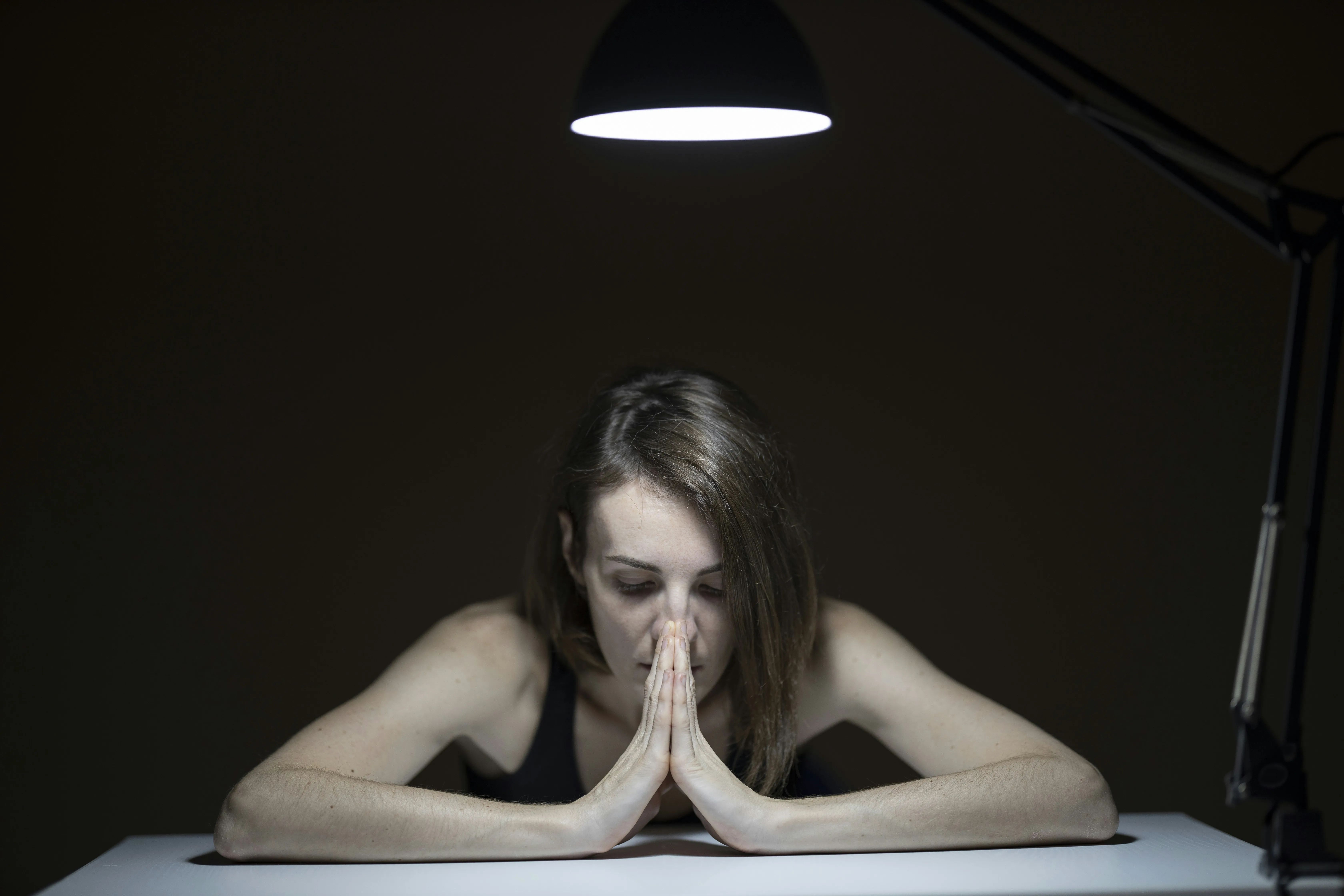 Pilgrim walking toward a distant church